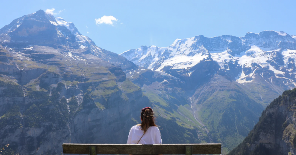 Sitting with a view of the mountains, understanding what she has accomplished to get here